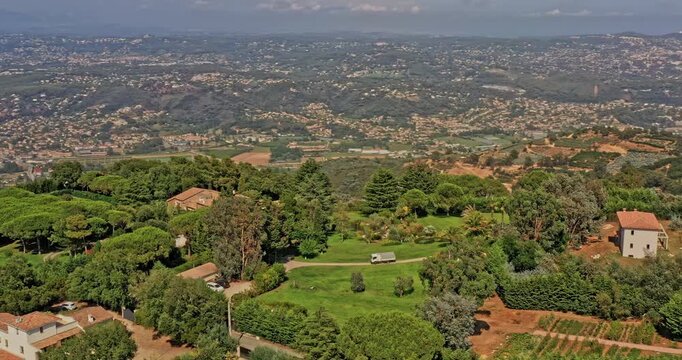 Tanneron France Aerial v27 circular pan around hillside estates and plantation at les plaines, capturing beautiful mountainous landscape and distance blue mediterranean sea - July 2021