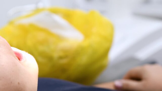 A dental procedure for treating or examining a patient in a dental clinic or office.