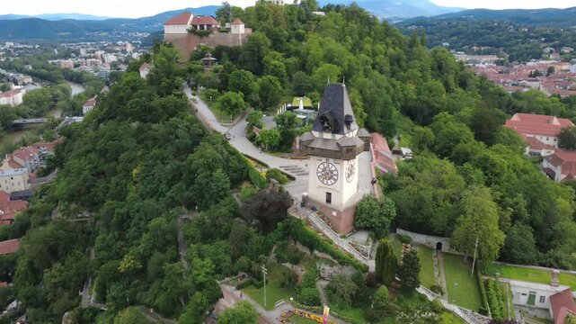 Aerial orbit of the clock tower on Schlossberg, Graz, Austria