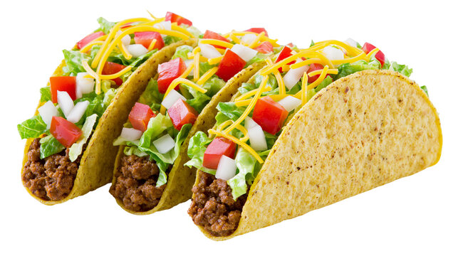 Three crunchy tacos with ground beef lettuce tomato onion, and cheese