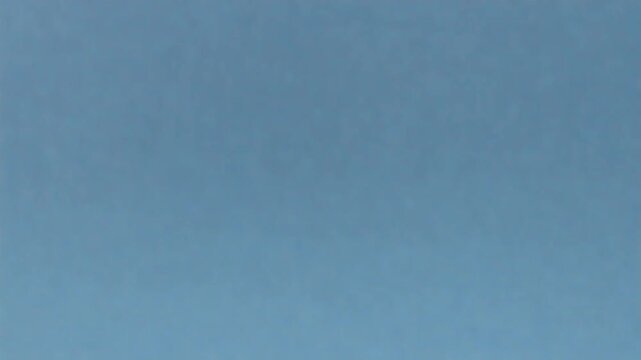 Tiny Glowing Frost Crystals Appearing and Dissolving Over a Blue Background, Sparkling Winter Science Motion Graphics Full HD