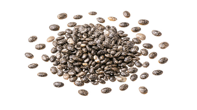 Pile of small oval chia seeds with grey and white speckles
