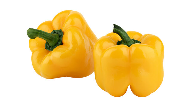 Two yellow bell peppers with green stems