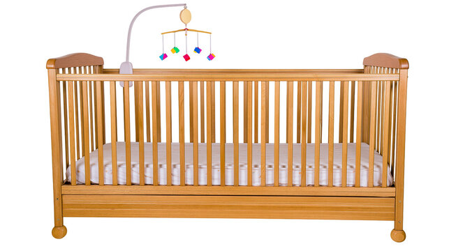 Wooden baby crib with mattress and mobile