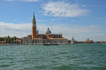 Fototapeta premium Italy, Venice, October 01, 2025, San Giorgio Maggiore island in Venice, Italy. In the center, you can see the Church of San Giorgio Maggiore — a Renaissance temple designed by Andrea Palladio