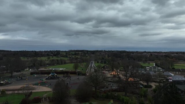 Atmospheric Aerial View of Wicksteed Amusement Park Under Dramatic Cloudy Sky in Kettering England