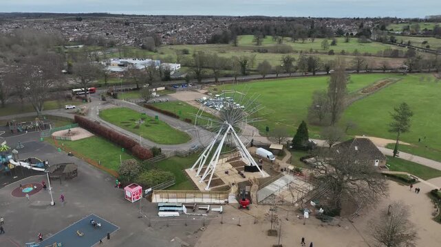 Aerial Drone Orbit View of Pyramid Swing Ride and Carousel at Wicksteed Park Kettering UK