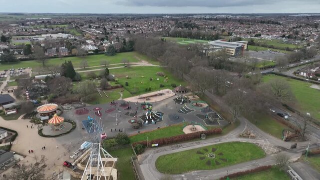 Aerial Drone View of Ferris Wheel and Fairground Rides at Wicksteed Amusement Park Kettering UK