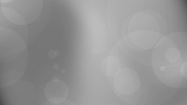Silver circle abstract glowing background with elegant metallic bokeh