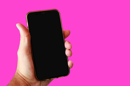 Smartphone fondo rosa tel&eacute;fono pantalla en negro fondo rosa fucsia pink fuchsia background