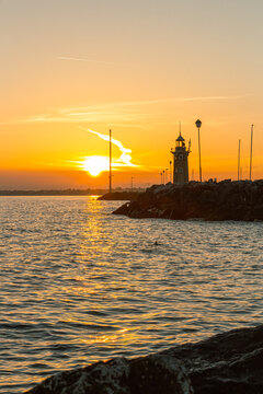 Sunrise at Desenzano Lighthouse on Lake Garda, Italy