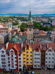 Obraz premium 2025-08-27; Scenic view of Kłodzko town hall tower rising over colorful houses. Kłodzko, Polan