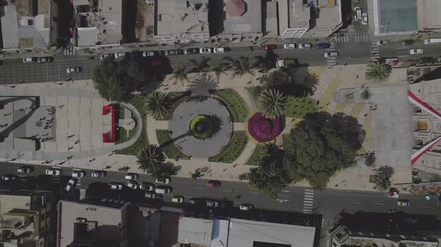 Aerial view of Tacna Cathedral surrounded by city streets and urban infrastructure in Tacna, Tacna, Peru.