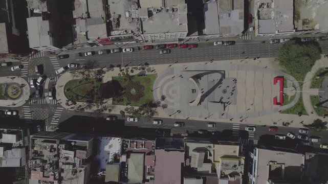 Aerial view of Tacna Cathedral surrounded by city streets and urban infrastructure in Tacna, Tacna, Peru.