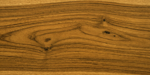 Fototapeta premium Close-up view of rich, warm brown wood grain with intricate natural patterns, showcasing a polished surface and organic texture.