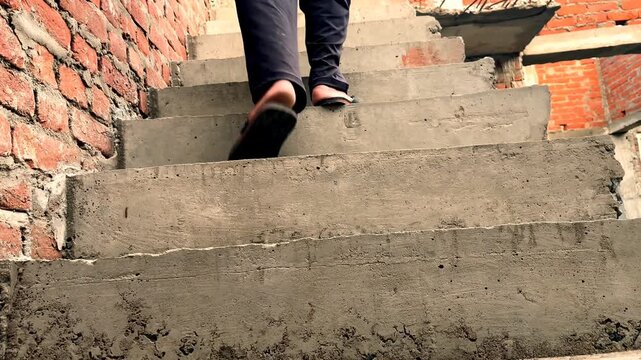 man walking up the stairs