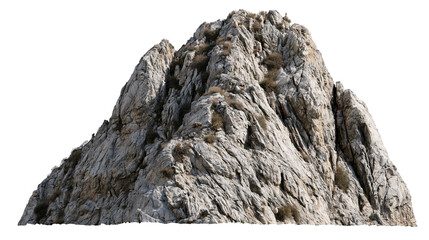Jagged grey granite mountain peak with sparse dry vegetation © Patricia