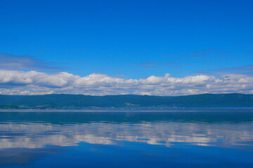 Fototapeta premium The village of Slyudyanka on Lake Baikal. A village on Lake Baikal. Slyudyanka
