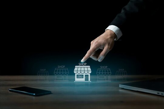 Businessman hand pointing at virtual shop icons representing retail business expansion plan