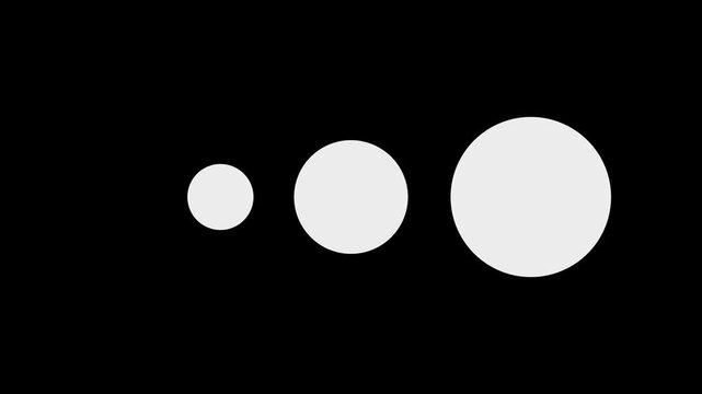 Three white circles of increasing size isolated on a solid black background.