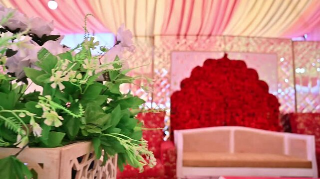 Elegant Artificial White Flower Arrangement with Blurred Luxury Wedding Stage Background