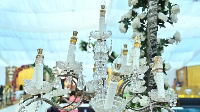 Luxury Crystal Wedding Candelabra with White Floral Decoration at Elegant Reception Venue &ndash; 4K Footage 
