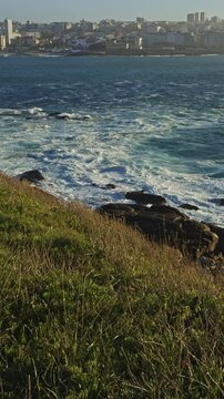 Waves crashing on rocky coastline