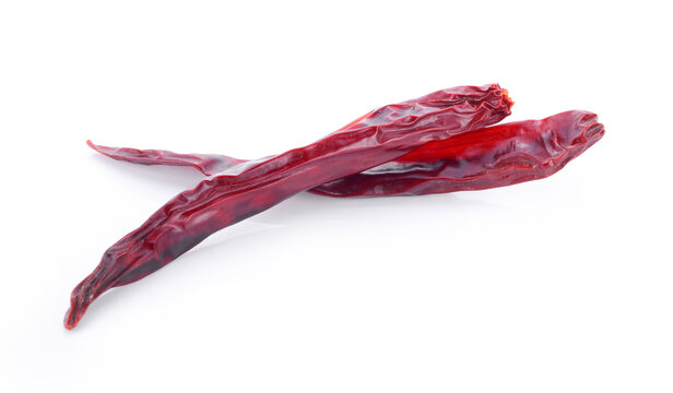 Dry chillies in the bowl isolate white background.