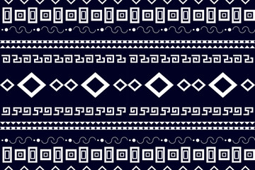 Ethnic Ikat embroidery oriental traditional Aztec floral paisley seamless pattern. Native textile geometric elements on white background. Tribal abstract style decor for fabric, ornaments, wallpaper © Naphasorn