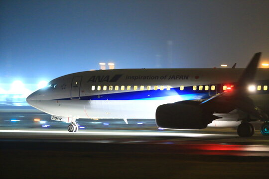 All Nippon Airways (ANA) Boeing 767 taxiing at night on February 22, 2015 in Aso Kumamoto Airport, Japan.
