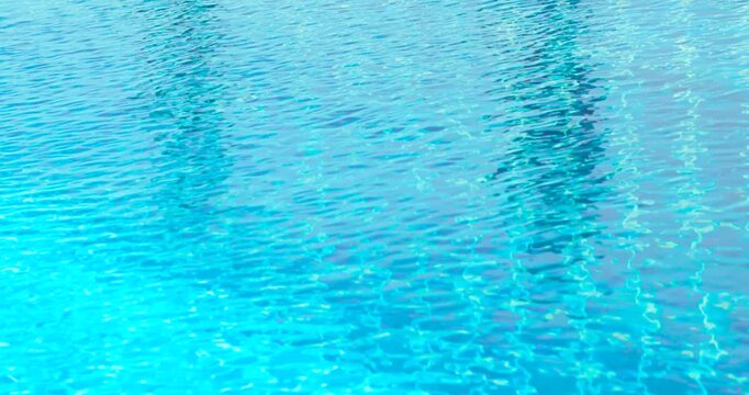 clear blue swimming pool water with shimmering reflections and tiled pattern, gentle moving ripples, abstract summer background ideal for travel, leisure, relaxation, wellness, refreshing, luxury pool