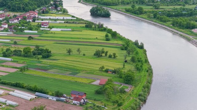 Gorazde, Bosnia and Herzegovina &ndash; May 31, 2026: Drone view of agricultural fields along a bend of the Drina River near Gorazde