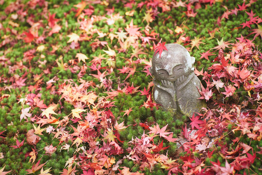 Jizo stone statue of Enkoji temple (Enkou-ji) in autumn, Kyoto, Japan.