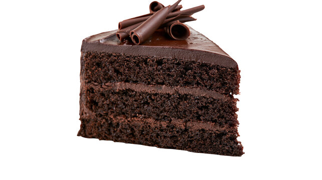 Rich chocolate cake slice with frosting and curls
