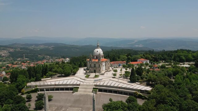 Aerial view of the Sanctuary of Our Lady of Sameiro surrounded by lush greenery and hills in Braga, Braga, Portugal.