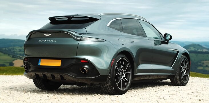Aston Martin DBX, English luxury SUV. car on the road