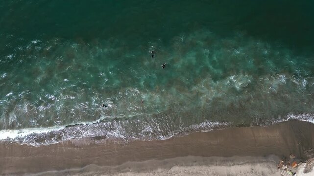 Top Down Drone View of Ocean Waves Breaking on Ecuador Beach, White Surf, Dark Water, Sandy Shore and Tropical Coastal Nature Background