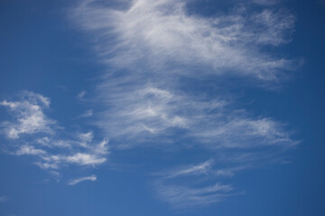 Obraz premium Natural background of blue sky and white clouds.