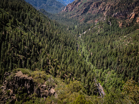 The deep cut via Route 89A through Oak Creek Canyon seen from above