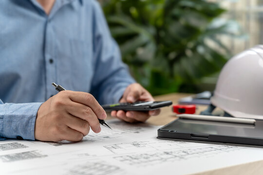 Engineer reviewing technical drawings,Performing engineering calculations for project planning, Design management,Construction scheduling, Ensuring accuracy,Quality control,Efficient project execution