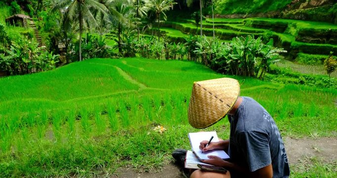 Man Reading Bible and Writing Journal in Bali Rice Fields, Indonesia | Peaceful Christian Devotional in Nature