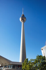 Berlin, Germany - April 22, 2026: Berlin TV Tower (Fernsehturm) rising above Alexanderplatz under a clear blue sky in the city center © Andrei Antipov