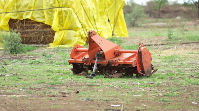 Agricultural Rotary Tiller Attachment on Farm Field &ndash; Modern Farming Equipment, 4K Footage