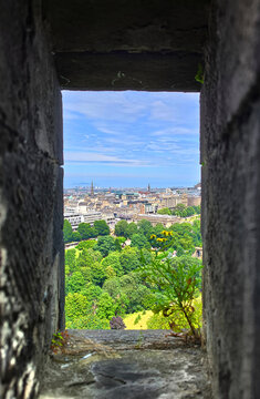 Looking out of Edinburgh Castle window to the city and green gar