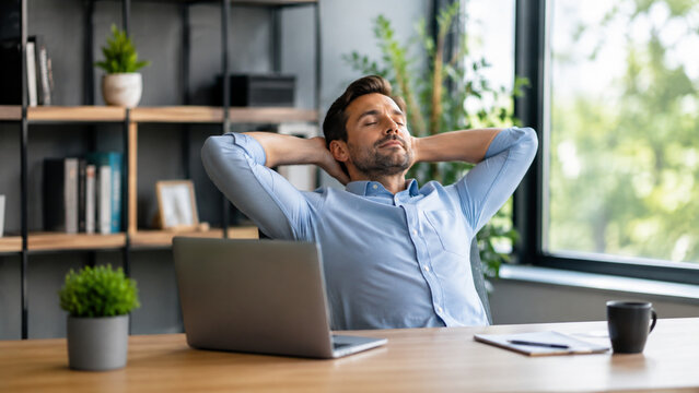Office worker taking a calm midday pause to prevent burnout