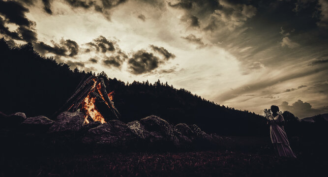 Priestess at the solstice fire.