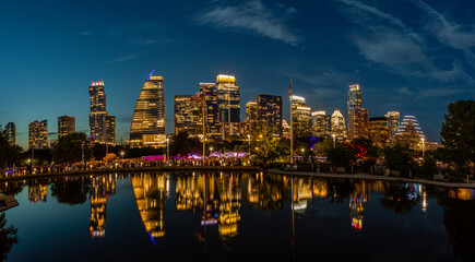 Austin skyline at night reflecting off Lady Bird Lake. © kbose