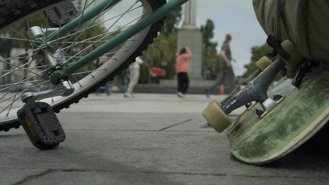 Bicycle Pedal and Skateboard Deck Close-Up - Monument Plaza Background