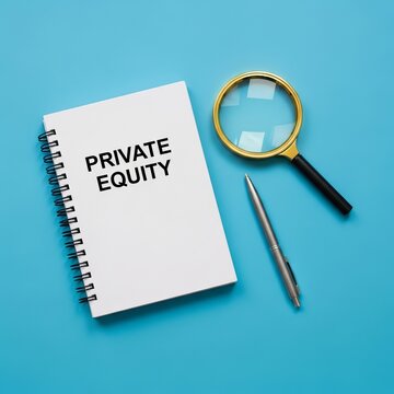 Private Equity Concept - Notebook, Magnifying Glass, and Pen on Blue Background.