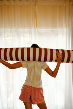 Balancing on Wooden Stool